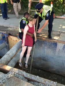Venessa Rule is hauled out of the pipeline trench by officers after refusing to leave on her own accord
